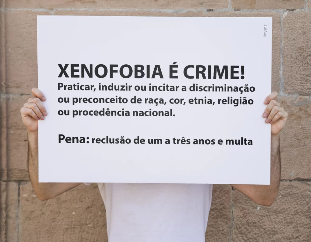 placa-escrito-xenofobia-e-crime